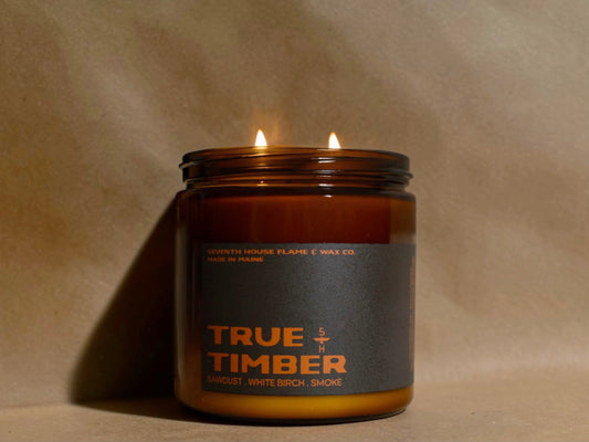 A amber colored jar with the label reading, True Timber.